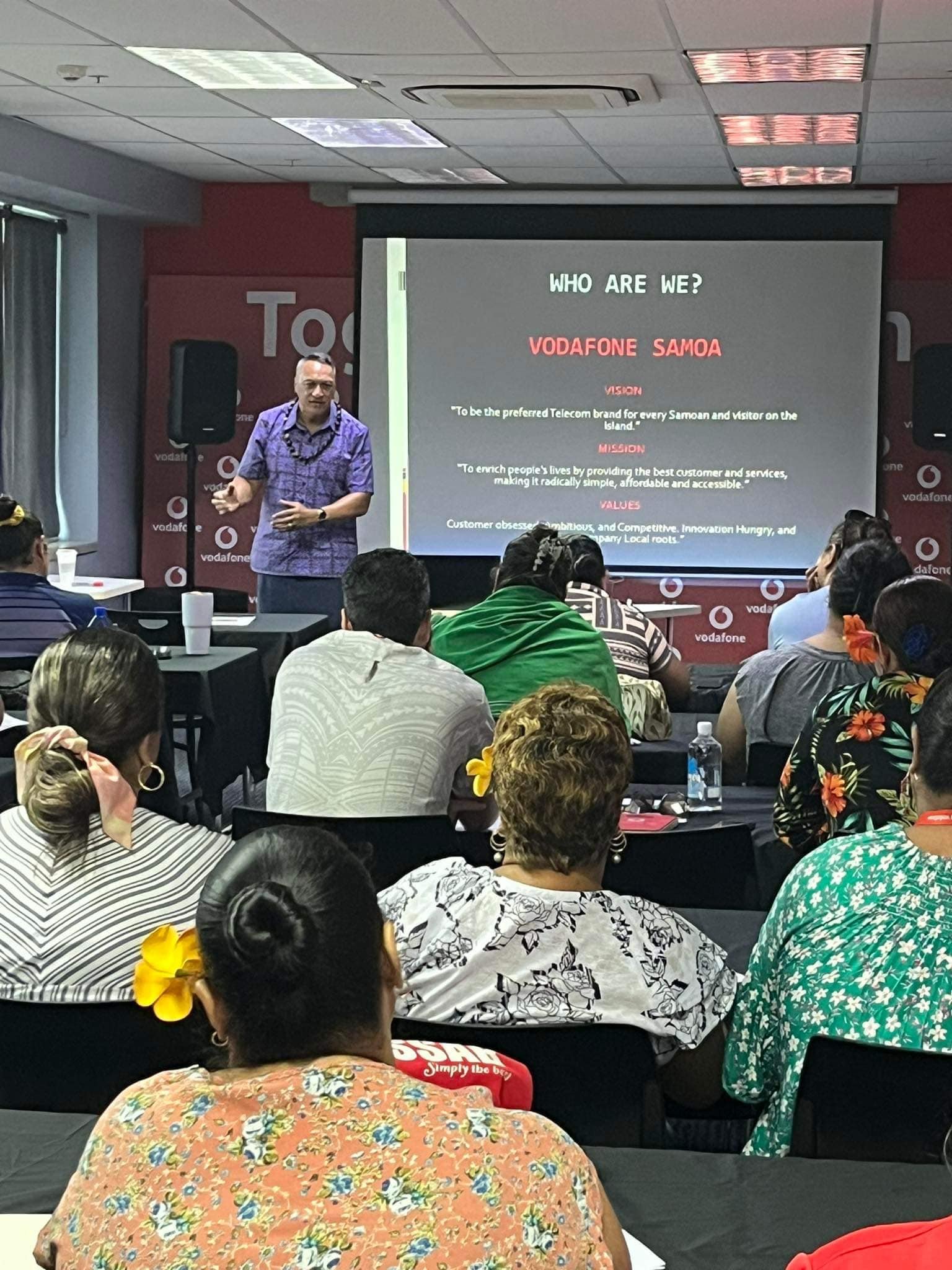 Lenny presenting a leadership session for Vodafone Samoa