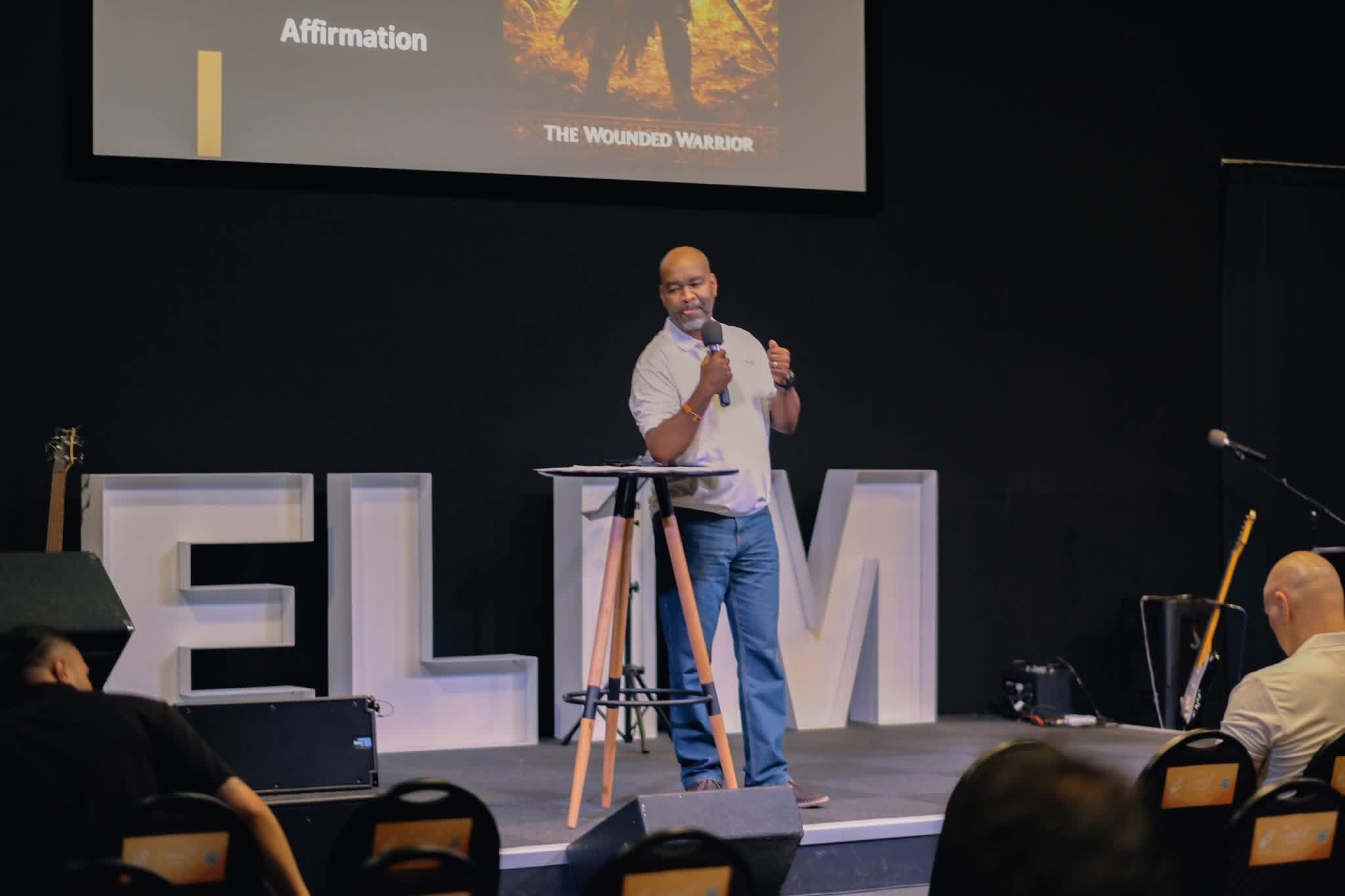 A speaker at the conference lectern