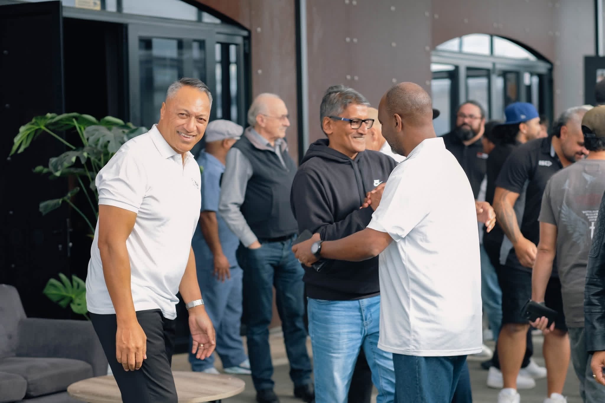 Conference delegates greeting one another