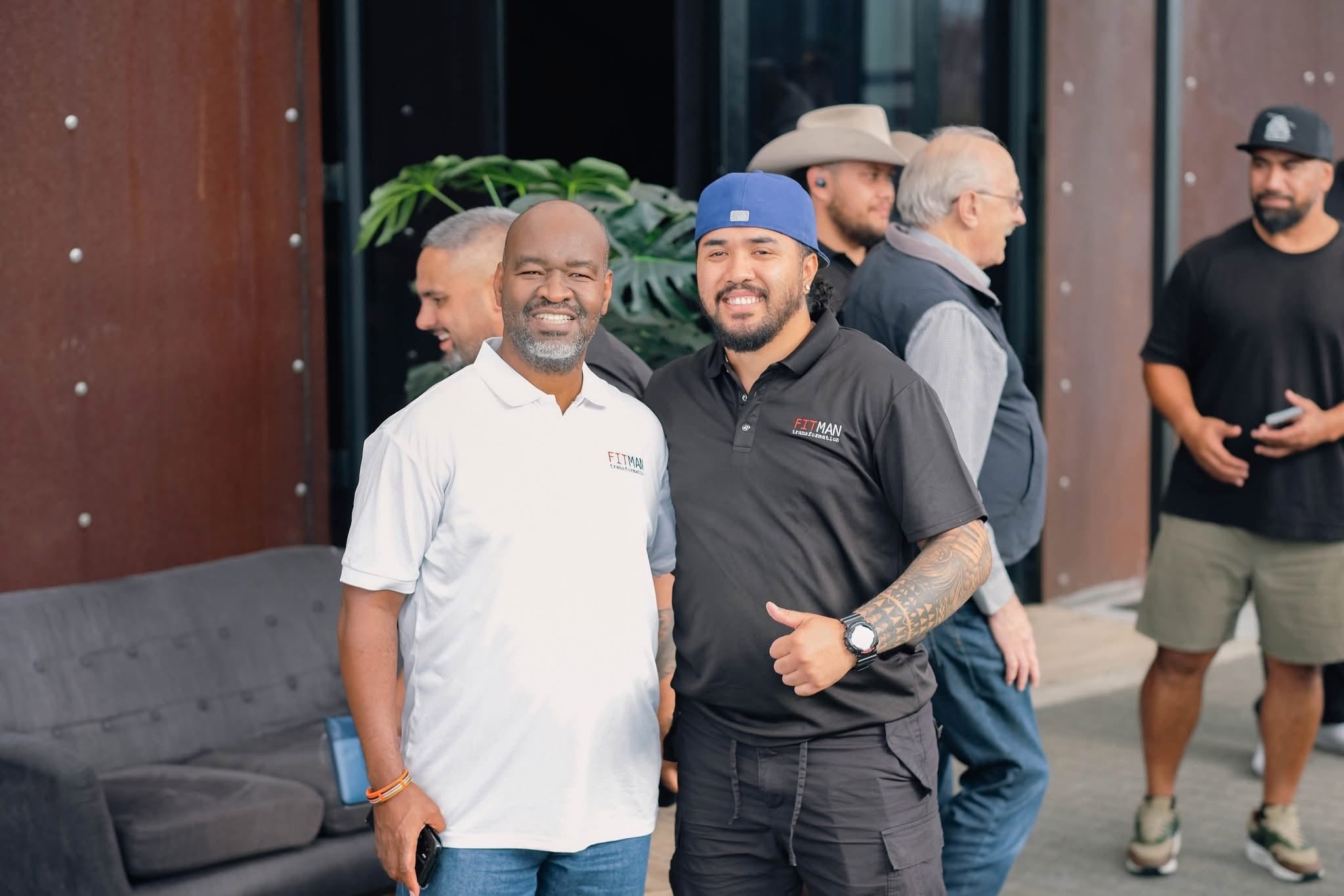 Two FITMAN delegates together outside the venue