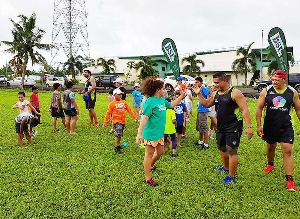 Children running during an outdoor Nobesity activity