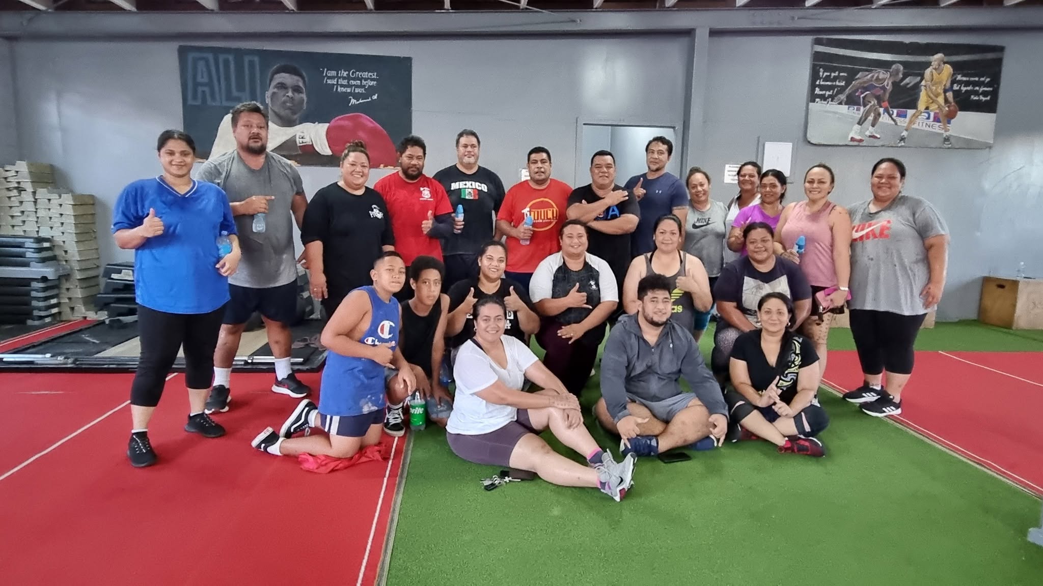 A group of participants after an indoor exercise session
