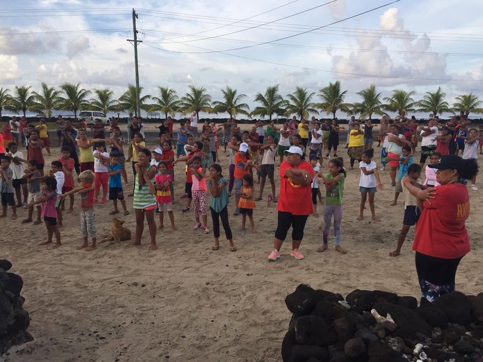 Families and children taking part in outdoor exercise